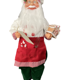 Boneco Papai Noel Cozinheiro segurando casa de doces e tábua com biscoito