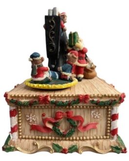 Máquina de Costura do Papai Noel com ajudantes sobre caixa de música decorada à corda com movimento na almofada dos ajudantes