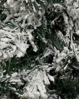 Árvore de mesa P com galhos verdes nevados, sem brilhos, base revestida com juta